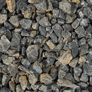 Close-up of small stones and pebbles in various shades of gray and brown.