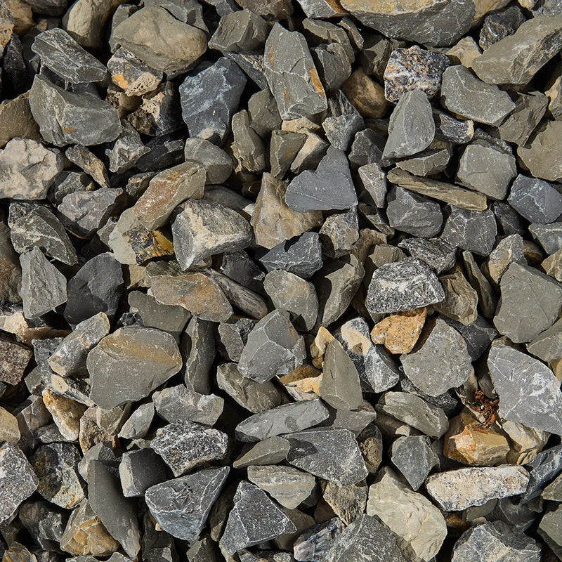 Close-up of small stones and pebbles in various shades of gray and brown.