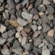 Close-up of a pile of small stones and pebbles with various colors.