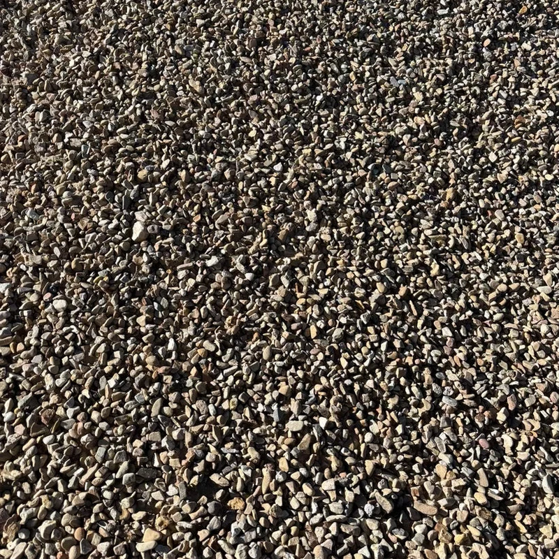 Close-up of textured brown and black gravel