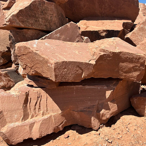 Stack of large brown stones in a natural setting