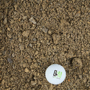 Crusher fines with a golf ball for scale