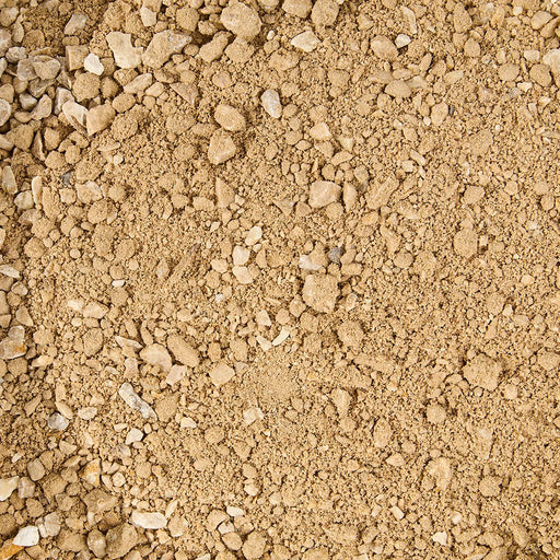 Close-up of a textured brown soil surface