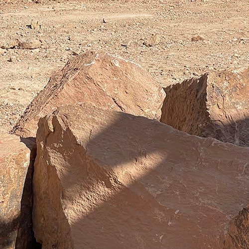 Close-up of Kibab Red boulders stone surface with shadows