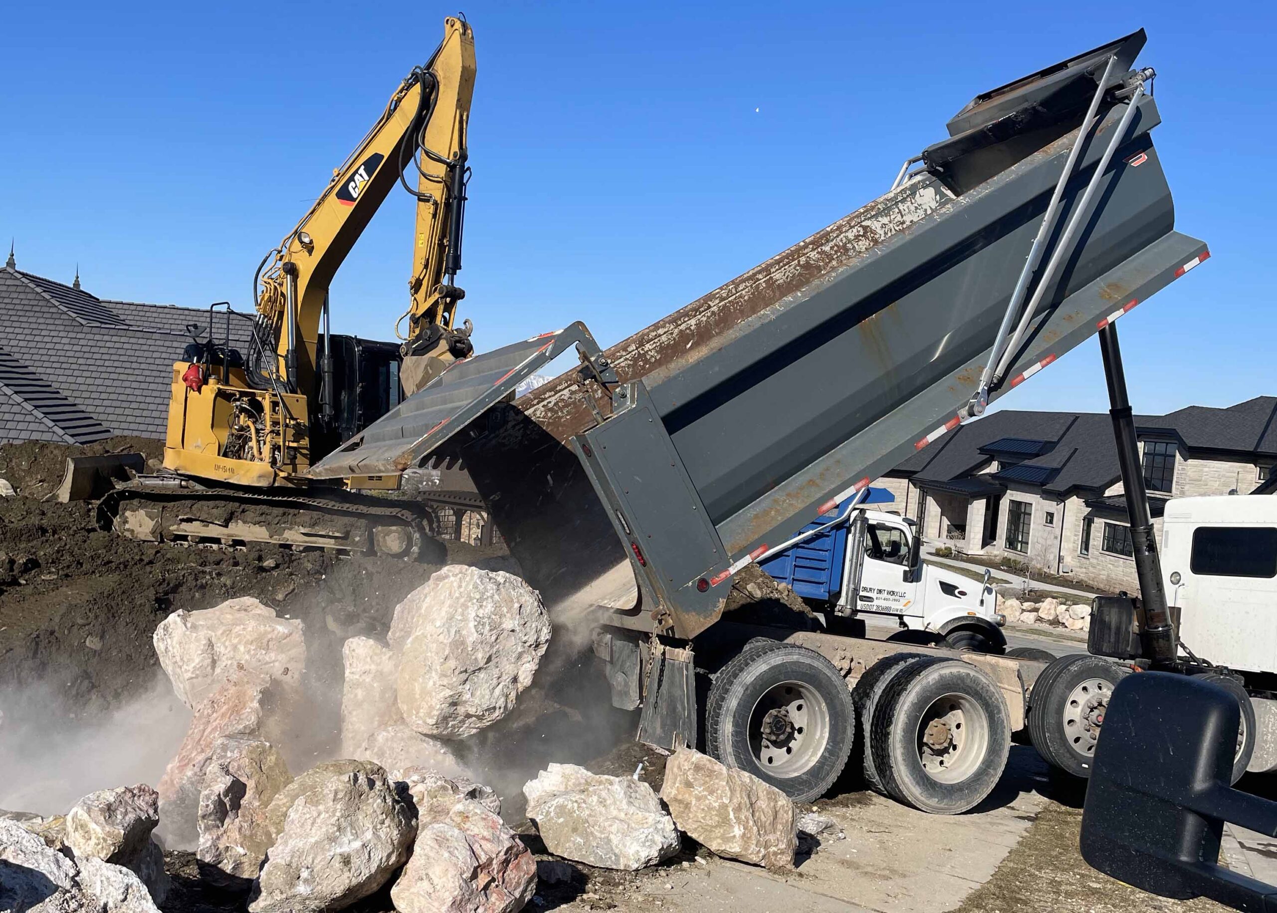 Back dump with boulders 7x5